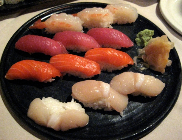 Nigiri (from top to bottom): sweet shrimp, tuna, salmon, and scallop.